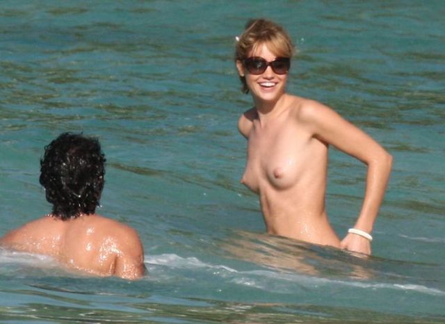 Julie Ordon topless on the beach - 14