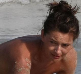 Time has no mercy even over the top models. Paulina Porizkova on the beach thumb