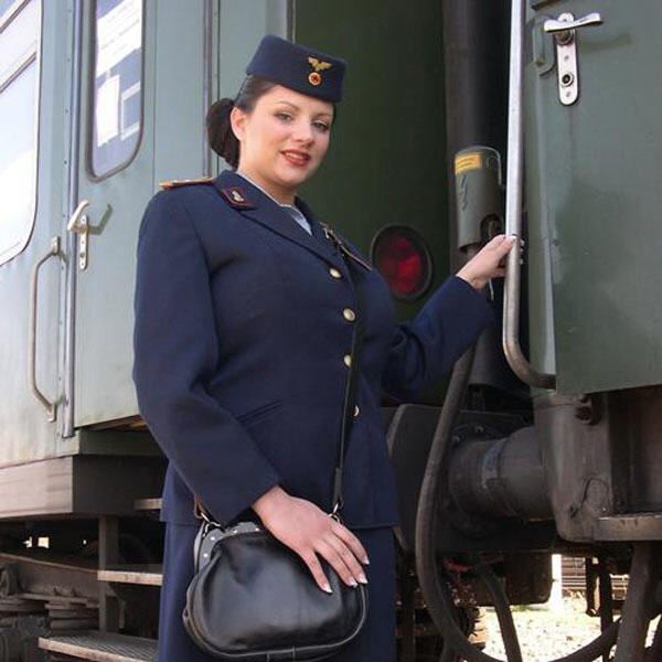 Gorgeous train attendant. It is a pity that I have not come across such attendants - 00