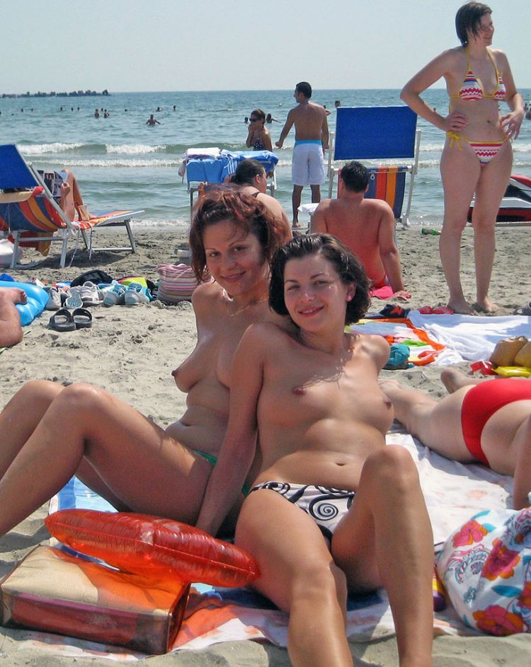 Girls like to be photographed topless on the beach - 05
