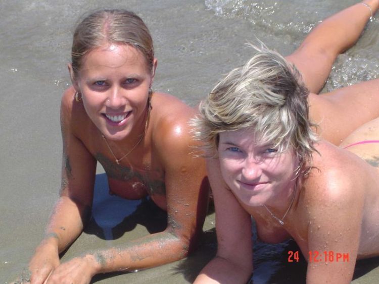 Girls like to be photographed topless on the beach - 09