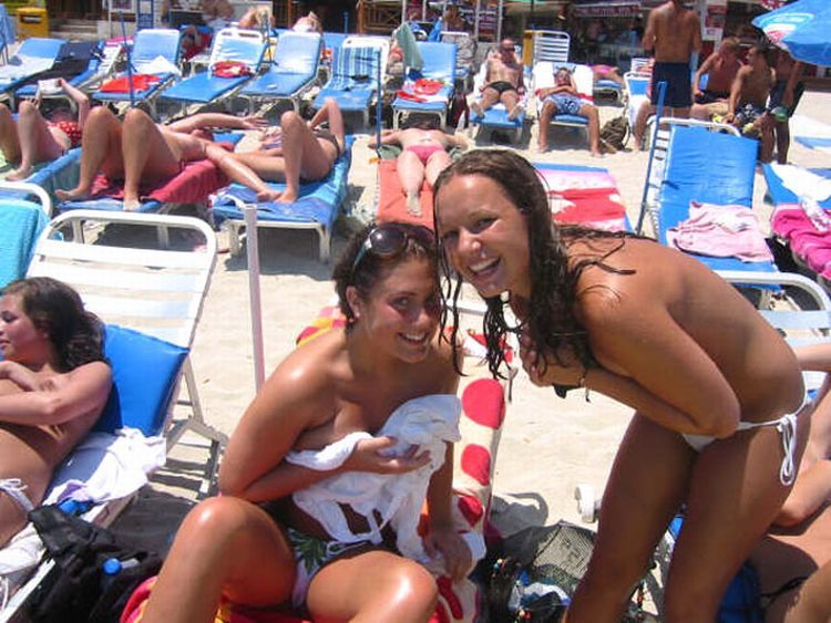 Girls like to be photographed topless on the beach - 17