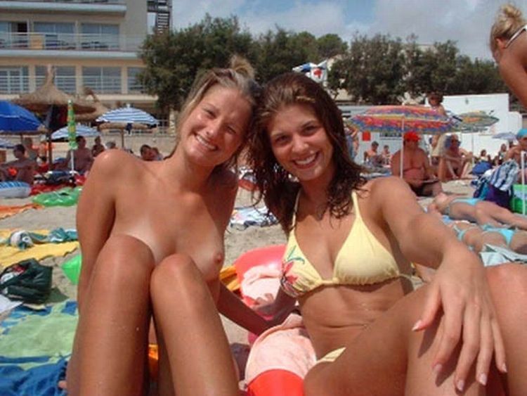 Girls like to be photographed topless on the beach - 18