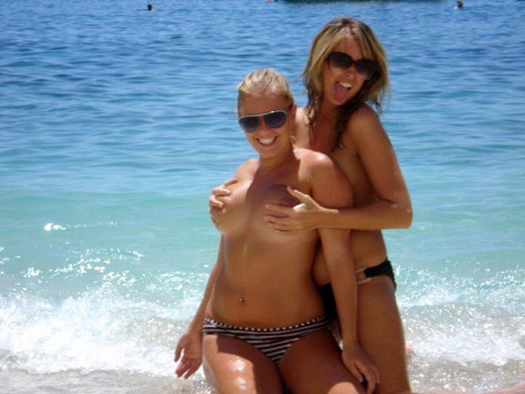 Girls like to be photographed topless on the beach - 22