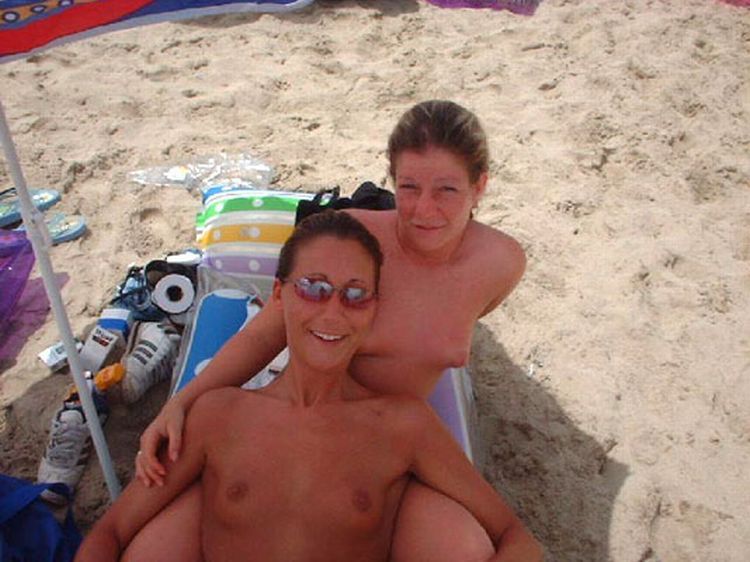 Girls like to be photographed topless on the beach - 28