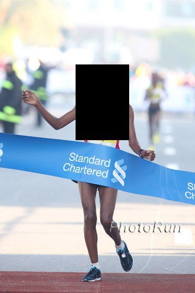 The winner of Dubai Marathon after she won the race. Not so easy to run a marathon... - 00