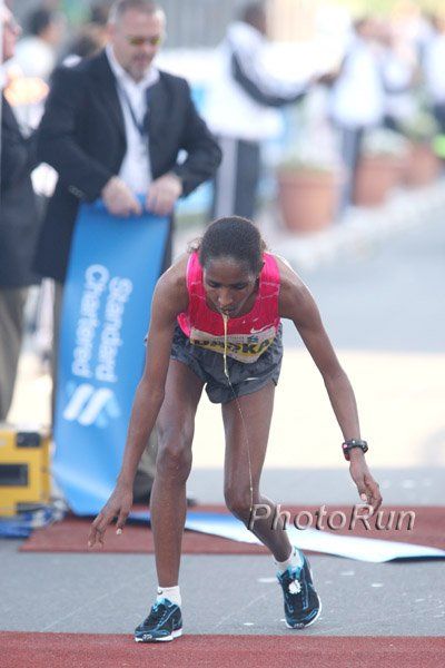The winner of Dubai Marathon after she won the race. Not so easy to run a marathon... - 03