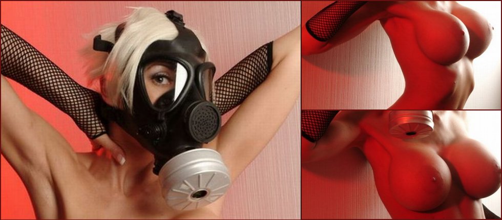 Sex-bomb Marie Carle is posing in a gas mask - 10