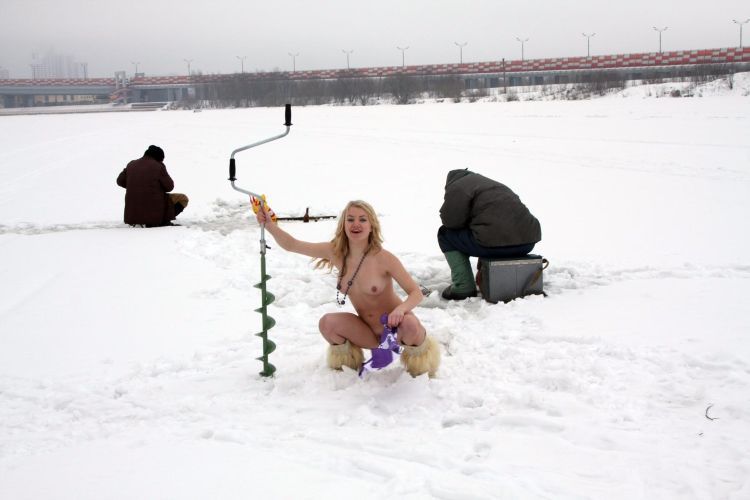 Naked blonde on a winter fishing - 12