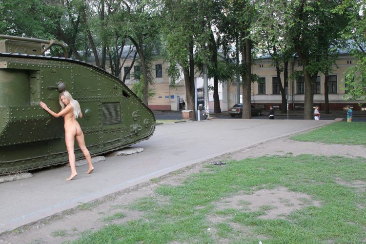 Ukrainian girl and an old tank - 09