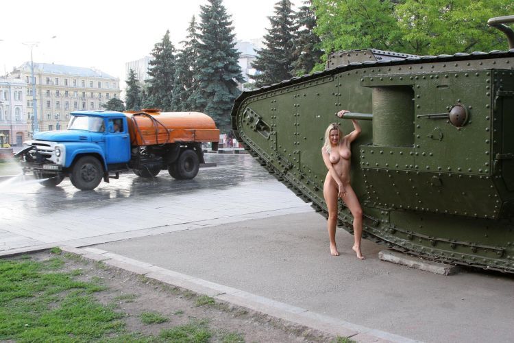 Ukrainian girl and an old tank - 11