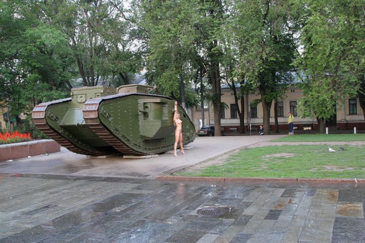 Ukrainian girl and an old tank - 12