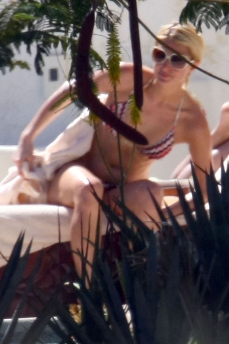 Paris Hilton sunbathing topless on holiday in Mexico - 03