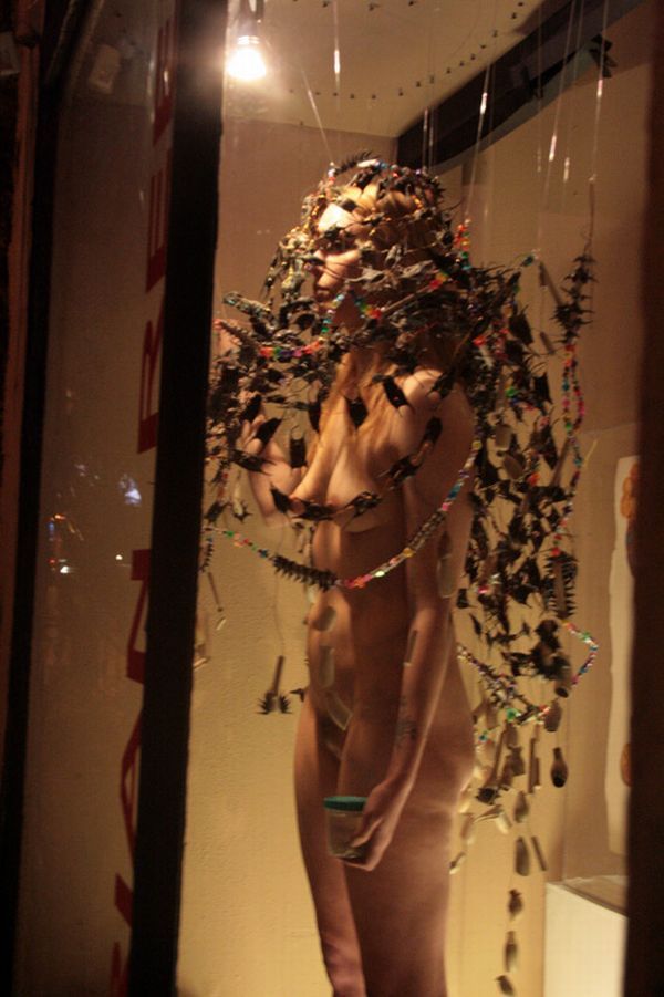 Nude model in the window of the New York gallery - 07