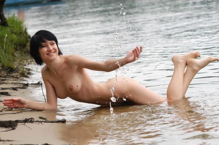 Slim babe having fun in the water - 13