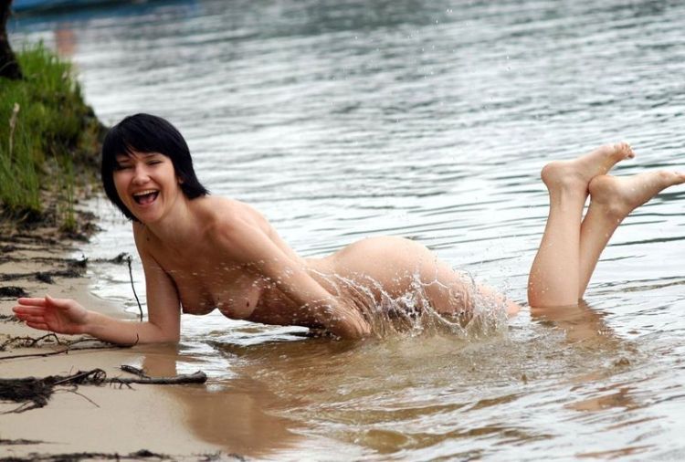 Slim babe having fun in the water - 14