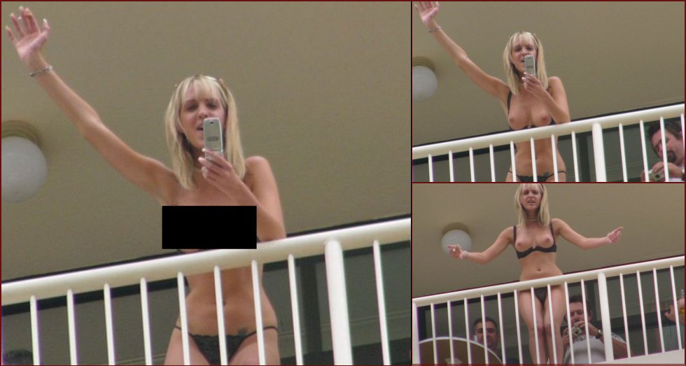 Stunning blonde topless on the balcony - 16