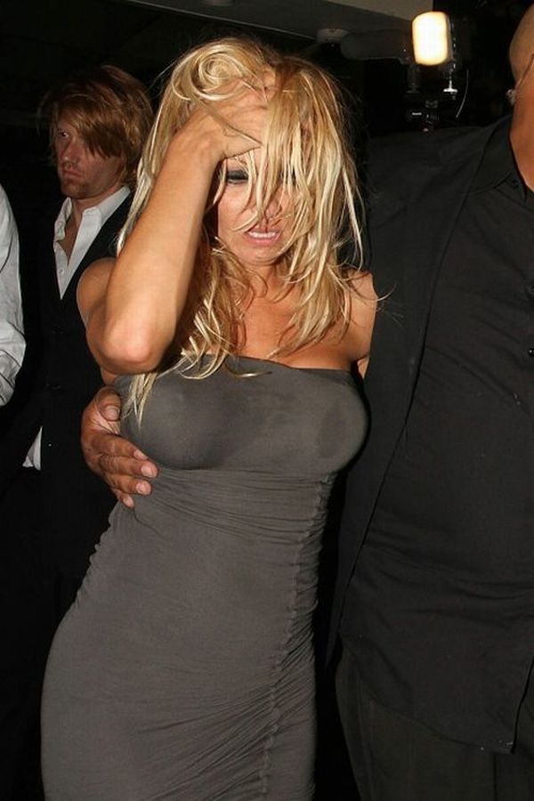 Drunk Pamela Anderson was taken out of the bar by the hands - 05