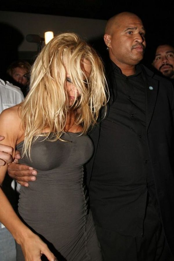 Drunk Pamela Anderson was taken out of the bar by the hands - 06