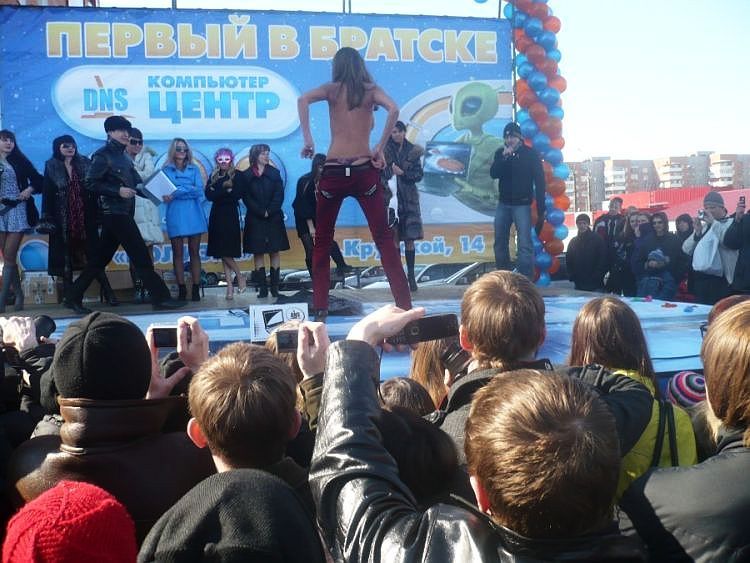 Striptease at the opening of a shop in the province of Russia - 11