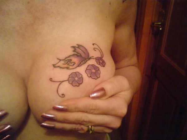 Tattoos on women's breasts – add to the beauty or disfigure it? - 39
