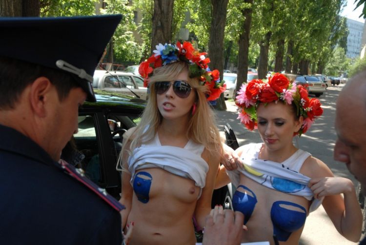 Activists from Femen and blue buckets - 04