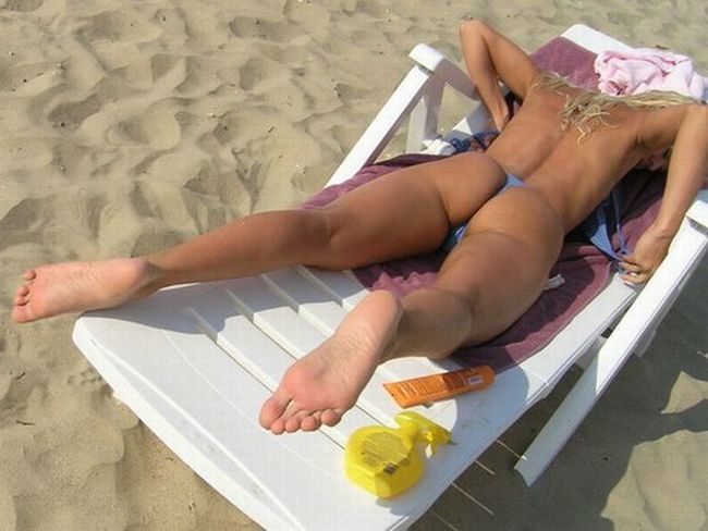 Funny poses on a nudist beach - 03