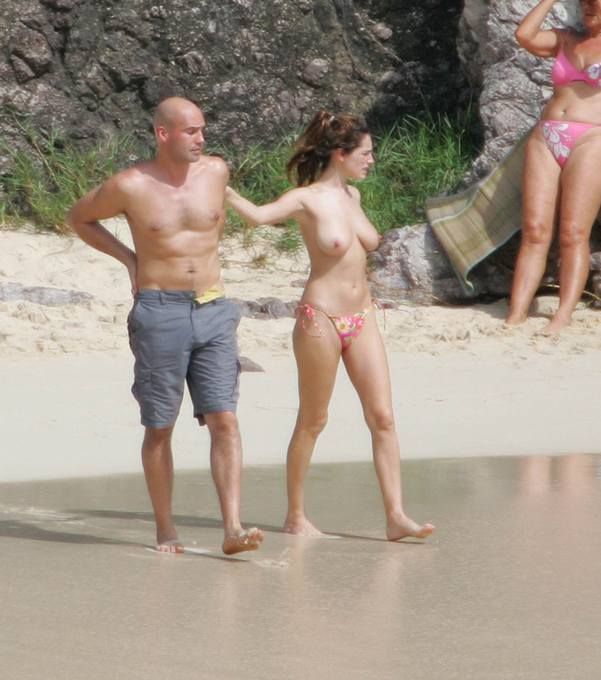 Kelly Brook rests topless on the beach - 03
