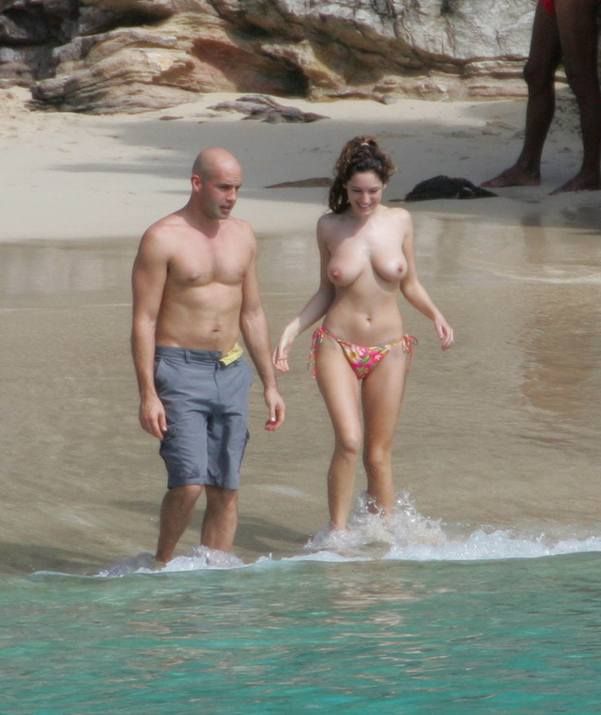 Kelly Brook rests topless on the beach - 04