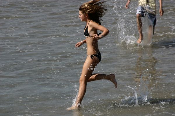 What a beautiful scene: girls running on the beach - 05
