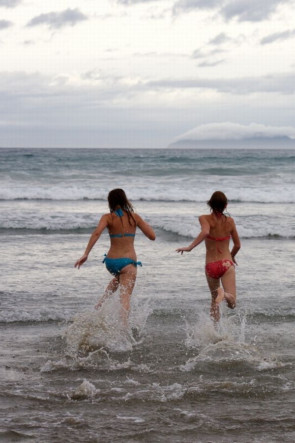 What a beautiful scene: girls running on the beach - 08